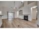 Bright living room featuring fireplace, built-in shelving, and sliding door at 726 Carolina Farms Blvd., Myrtle Beach, SC 29579