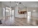 Open-concept living space with ceiling fans, hardwood flooring, and natural light at 726 Carolina Farms Blvd., Myrtle Beach, SC 29579