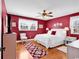 Bedroom featuring an abundance of natural light, wood floors, and a ceiling fan at 7609 Brentwood Dr., Myrtle Beach, SC 29572