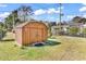 Storage shed in a well-maintained backyard, perfect for lawn equipment at 7609 Brentwood Dr., Myrtle Beach, SC 29572