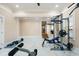 Bright basement gym with marble floors and exercise equipment ready for workouts at 8533 Cedar Trace Dr., Myrtle Beach, SC 29588