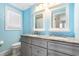 Updated bathroom with dual sinks, granite counters, modern fixtures, and natural light at 8533 Cedar Trace Dr., Myrtle Beach, SC 29588