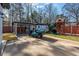 View of detached garage, matching golf cart and play set at 8533 Cedar Trace Dr., Myrtle Beach, SC 29588