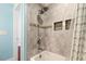 Renovated shower with a niche, modern fixtures, and custom tile surround at 8533 Cedar Trace Dr., Myrtle Beach, SC 29588