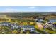 Aerial view of the community featuring a golf course, ponds, and well-manicured landscaping at 100 Cypress Point Ct. # 105, Myrtle Beach, SC 29579