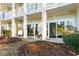 Outdoor patio space with comfortable seating and sliding glass doors leading to the inside at 100 Cypress Point Ct. # 105, Myrtle Beach, SC 29579