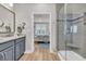 Bathroom showcasing modern fixtures and finishes leading into a bedroom with great light at 1016 Longwood Bluffs Circle, Murrells Inlet, SC 29576