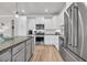 Close up of a well-equipped kitchen with stainless steel appliances and granite countertops at 1016 Longwood Bluffs Circle, Murrells Inlet, SC 29576