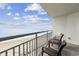 Ocean view from the outdoor seating area on the balcony with chairs and end table at 107 S Ocean Blvd. # 602, Myrtle Beach, SC 29577