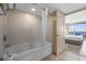 Inviting tub in the bathroom with a door leading to the Primary bedroom and ocean view at 107 S Ocean Blvd. # 602, Myrtle Beach, SC 29577