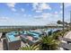 Community pool area with outdoor seating and lounge chairs near the beach at 107 S Ocean Blvd. # 602, Myrtle Beach, SC 29577