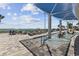 Relaxing pool deck with lounge chairs and umbrellas, perfect for soaking up the sun and enjoying ocean views at 107 S Ocean Blvd. # 602, Myrtle Beach, SC 29577