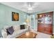 Charming living room features a sofa with decorative pillows and a glass door china cabinet at 109 Deer Tree Dr., Murrells Inlet, SC 29576