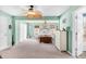 Spacious main bedroom featuring a ceiling fan and connecting doors at 109 Deer Tree Dr., Murrells Inlet, SC 29576