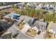 Aerial view of the residential area with mature trees, community pool and well-maintained homes at 1118 Prescott Circle, Myrtle Beach, SC 29577