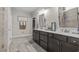 Bathroom featuring double sink vanity with white countertops and a walk-in shower at 1118 Prescott Circle, Myrtle Beach, SC 29577