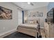 Comfortable bedroom with a queen-size bed, ceiling fan, and aviation-themed decor at 1118 Prescott Circle, Myrtle Beach, SC 29577