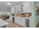 Entertainer's kitchen with glass cabinets, a wine fridge, and counter space at 1118 Prescott Circle, Myrtle Beach, SC 29577