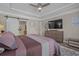 Spacious main bedroom featuring tray ceilings, ensuite and a decorative accent wall at 1118 Prescott Circle, Myrtle Beach, SC 29577