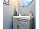 Bathroom featuring gray cabinets, updated hardware and fixtures, and cool gray walls at 1144 Harvest Circle # 1144, Myrtle Beach, SC 29579