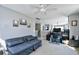 Cozy living room with a neutral color scheme and a comfortable gray sofa at 1144 Harvest Circle # 1144, Myrtle Beach, SC 29579