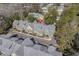 Aerial view of colorful townhomes with manicured lawns and tree-lined streets at 136 Da Gullah Way # B, Pawleys Island, SC 29585