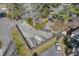 Aerial view of a fenced parking area featuring boats, trailers, and parking for cars at 136 Da Gullah Way # B, Pawleys Island, SC 29585