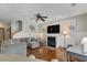 Cozy living room featuring a fireplace, hardwood floors, and comfortable seating at 136 Da Gullah Way # B, Pawleys Island, SC 29585