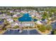 Beautiful aerial view of townhomes surrounding a scenic pond with a fountain and lush landscaping at 1450 Portrait Circle # 1450, Myrtle Beach, SC 29577