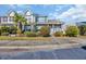 A charming two-story townhouse with manicured landscaping and a welcoming entrance at 1450 Portrait Circle # 1450, Myrtle Beach, SC 29577