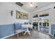 Charming eat-in kitchen with a white table and chairs, bathed in natural light from a large sliding door at 1450 Portrait Circle # 1450, Myrtle Beach, SC 29577