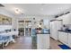 Bright eat-in kitchen featuring an island and sliding glass doors that lead to an outdoor area at 1450 Portrait Circle # 1450, Myrtle Beach, SC 29577