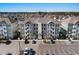 Beautiful aerial view of the condo building with easy parking, exterior staircases, and a manicured landscape at 149 Ella Kinley Circle # 405, Myrtle Beach, SC 29588