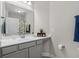 Well-lit bathroom featuring a gray vanity with white countertop and decorative accents at 149 Ella Kinley Circle # 405, Myrtle Beach, SC 29588