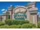 Elegant entrance sign for Queens Harbour with manicured landscaping and stone pillars at 149 Ella Kinley Circle # 405, Myrtle Beach, SC 29588