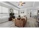 Inviting living room with natural light, a ceiling fan, and view into kitchen at 149 Ella Kinley Circle # 405, Myrtle Beach, SC 29588