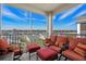 Relaxing screened porch with comfortable seating and neighborhood views at 149 Ella Kinley Circle # 405, Myrtle Beach, SC 29588