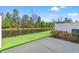 Lakeside backyard with grass and concrete patio at 1541 Palmina Loop # C, Myrtle Beach, SC 29588