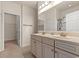 Well-lit bathroom featuring double sinks and a walk-in closet at 1541 Palmina Loop # C, Myrtle Beach, SC 29588