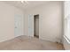 Bedroom featuring neutral carpeting, a closet, and windows at 1541 Palmina Loop # C, Myrtle Beach, SC 29588