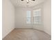 Empty bedroom featuring carpeting and bright windows at 1541 Palmina Loop # C, Myrtle Beach, SC 29588