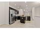 Kitchen featuring stainless steel appliances, granite countertops, an island, and dark wood cabinets at 1541 Palmina Loop # C, Myrtle Beach, SC 29588