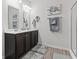 Bright bathroom with a double sink vanity, modern fixtures, and stylish decor at 156 Legends Village Loop, Myrtle Beach, SC 29579