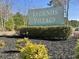 Community entrance sign at Legends Village, with landscaped bushes and mulch beds at 156 Legends Village Loop, Myrtle Beach, SC 29579