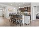 Open-concept kitchen with bar seating, granite countertops, and modern appliances, perfect for entertaining at 156 Legends Village Loop, Myrtle Beach, SC 29579