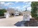 Entrance into the Egret Run community with signage, landscaping, and well-maintained condos at 157 Egret Run Ln. # 522, Pawleys Island, SC 29585