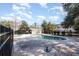 Community swimming pool enclosed by a black fence with plenty of open sky at 157 Egret Run Ln. # 522, Pawleys Island, SC 29585