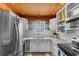 Well-lit kitchen with marble countertops, white cabinetry, and modern stainless steel appliances at 1607 Havens Dr., North Myrtle Beach, SC 29582