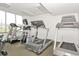 Well-equipped fitness center with treadmills, ellipticals, and natural light at 1625 S Ocean Blvd. # 403, North Myrtle Beach, SC 29582