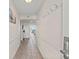 Inviting hallway with neutral tones, tiled flooring, and coat hooks at 1625 S Ocean Blvd. # 403, North Myrtle Beach, SC 29582